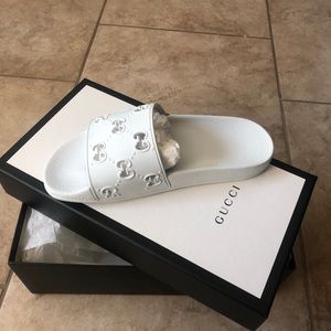 White Gucci slides